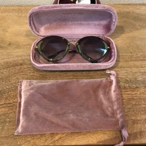MIU MIU green cat eye sunglasses